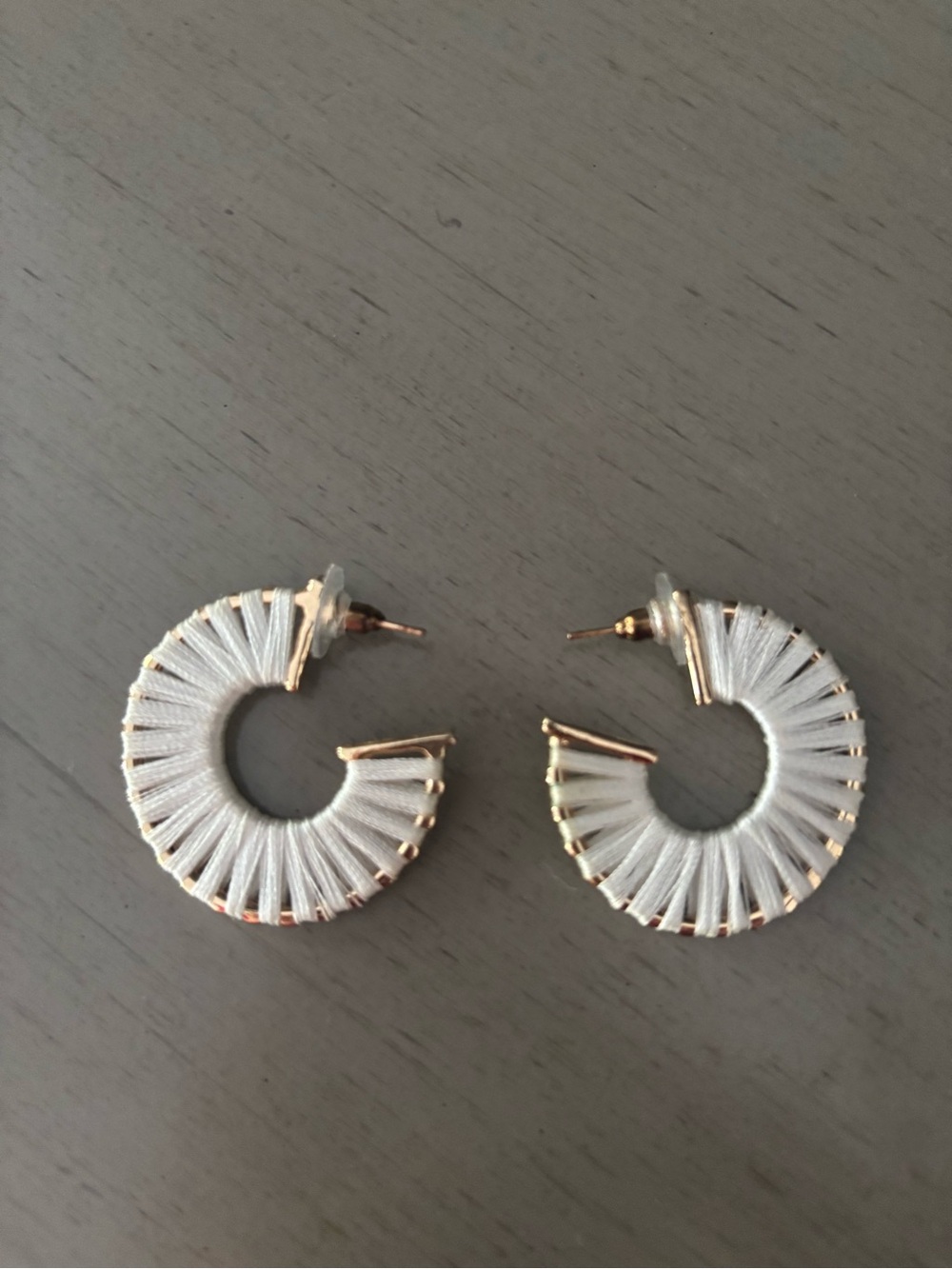 White raffia wrapped gold tone earring